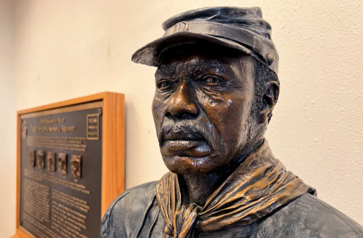 A sculpture, called “The Old Soldier” by artist Eddie Dixon honors the legacy of the Buffalo Soldier.